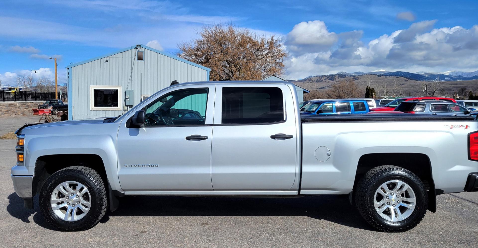 2014 Silver /Gray Chevrolet Silverado 1500 LT (3GCUKRECXEG) with an 5.3L V8 engine, 6 Speed Auto transmission, located at 450 N Russell, Missoula, MT, 59801, (406) 543-6600, 46.874496, -114.017433 - Nice 4WD. 5.3L V8. 6 Speed Automatic Transmission. Bose Sound System. Navigation. Bluetooth. Backup Camera. Remote Start. Power Drivers Seat. Towing. Rear Parking Sensors. - Photo#1